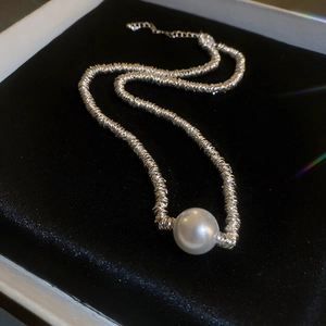 Minimalist silver-tone irregular textured choker necklace with a large white round pearl