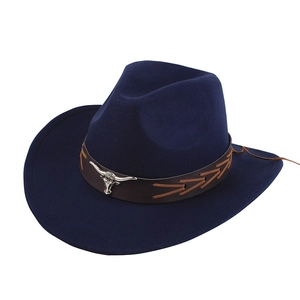 Detailed view of navy felt cowboy hat featuring a leather band with silver bull head ornament