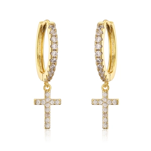 Gold huggie hoop earrings with sparkling cross charms set in cubic zirconia