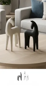 Detailed close-up showing the matte textured finish of black and white resin horse statues