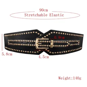 Women's black elastic waist belt with gold stud rivets and a classic metal buckle