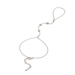 Silver stainless steel bracelet ring set with sparkling zircons on white background