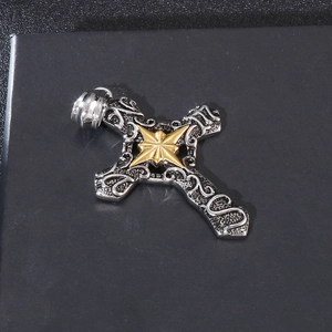 Vintage Gothic cross pendant with golden octagonal star on black textured background