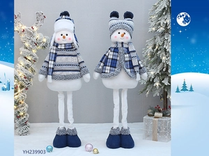 Detail of blue telescopic Christmas snowmen ornaments with retractable legs and snowflake patterns