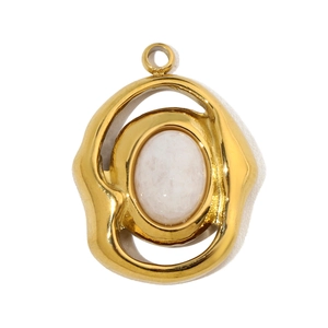 Macro view of gold-plated stainless steel pendant with oval natural white stone inlay