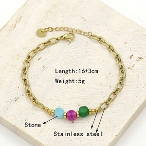 Detailed view of gold stainless steel bracelet featuring blue, purple and green natural stones