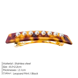 Minimalist leopard acetate hair clip with eight pearls on a gold stainless steel base