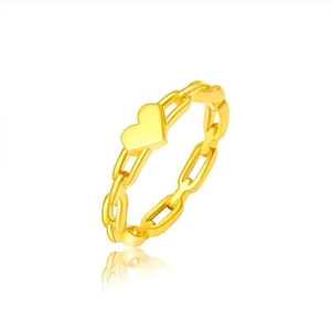 Elegant gold chain ring with heart pendant made of titanium steel on white background