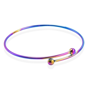 Macro detail of rainbow iridescent titanium steel open cuff bracelet with metallic beads
