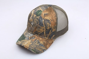 Detail of woodland camouflage trucker hat featuring breathable mesh and SECLUSION 3D print