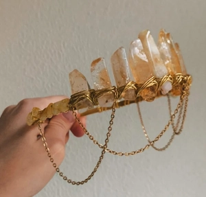 Detailed craftsmanship of citrine crystal crown with delicate hanging gold chains