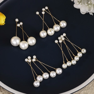 Elegant bridal gold wire earrings with handmade white pearls for weddings and parties