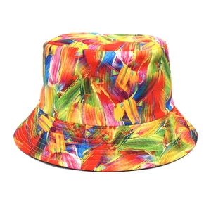 Detailed view of colorful oil painting tie-dye bucket hat with cotton canvas texture