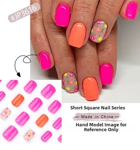 Short square press-on nails featuring floral patterns and vibrant solid color finishes