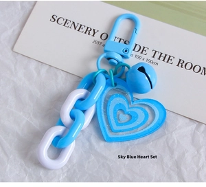 Sky blue heart keychain with acrylic layers, round bell, and blue-white decorative chain
