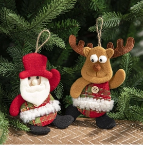 Close-up of handmade Santa and reindeer felt ornaments with festive red plaid details