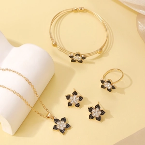 Golden five-petal flower jewelry set including necklace bracelet ring and earrings