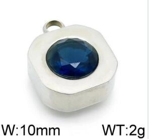 Detail view of square silver pendant with a round faceted navy blue crystal stone
