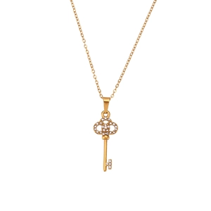 Elegant gold key pendant necklace with hollow pattern and micro-set cubic zirconia