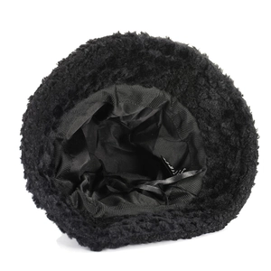 Detail view of the black faux fur bucket hat featuring inner lining and adjustable drawstring