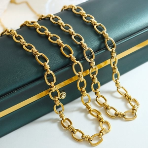 18K gold plated titanium interlocking chunky chain necklace on dark green gift box