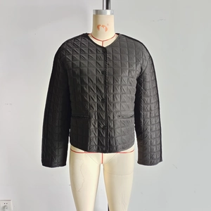 Women's black quilted jacket with crew neck and classic plaid pattern puffer style