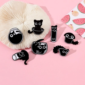 Detailed set of seven funny black cat enamel pins in various glass containers