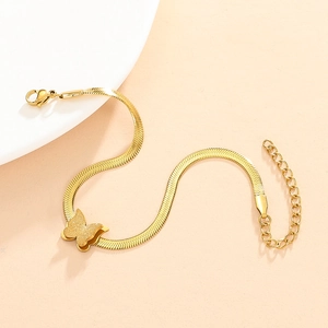 Detail of 18K gold-plated snake chain bracelet with frosted butterfly charm and lobster clasp