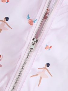 Detail of pink hooded jacket featuring ballet dancer prints and a metallic zipper