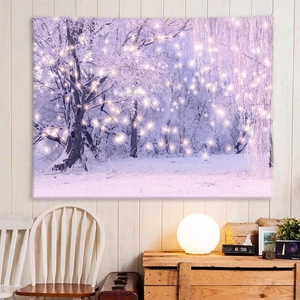 Cozy winter snowy forest tapestry with fairy lights on a light wood wall decor