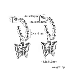 Macro view of stainless steel butterfly drop earrings with antiallergic silver finish