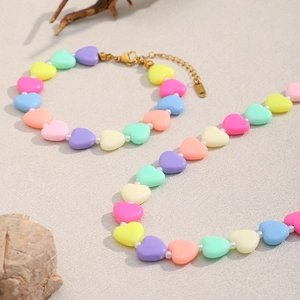 Macro shot of S925 silver clasp on colorful acrylic heart bead necklaces