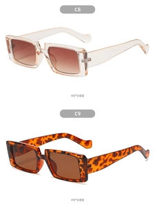 Detail view of vintage rectangle sunglasses in champagne and tortoiseshell finishes