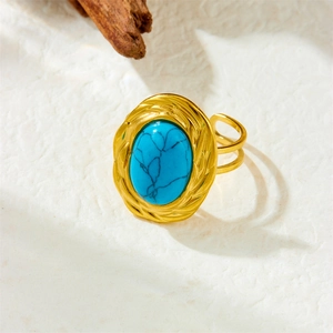 Vintage 18K gold adjustable open ring featuring an oval turquoise stone with natural veins