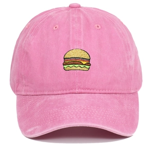 Close-up of pink washed cotton baseball cap with embroidered burger motif and vintage texture