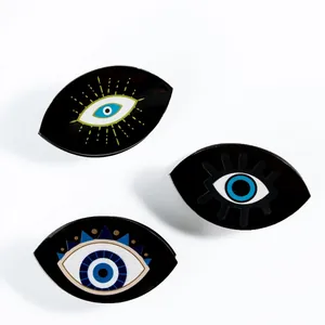 Three-piece set of black acrylic evil eye hair claws with stylish eye print patterns