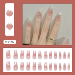 Pink gradient cat-eye press-on nails with glitter rhinestones in coffin shape