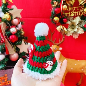 Handmade knitted Christmas pet hat with festive snowman charms and white pompom