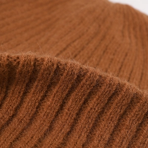 Thick brown ribbed knit beanie for women showing warm double-layer texture and soft fabric
