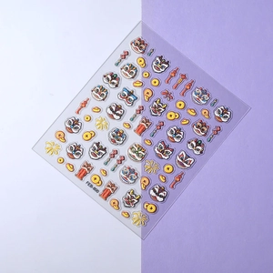 Macro detail of 5D Chinese New Year nail art stickers featuring lion dance and gold ingots