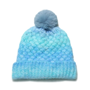 Detailed knit texture of blue gradient beanie with a soft faux fur pom-pom on top