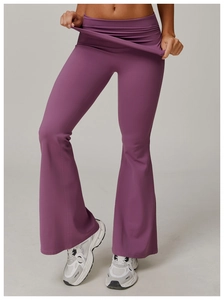 Detail of high waisted fold-over waistband on purple flare yoga pants for women