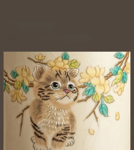 Detailed close-up of hand-painted tabby cat and yellow flowers on ice-crack glazed ceramic