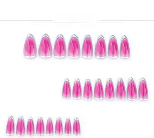 Detail of rose red gradient stiletto press-on nails with silver rimmed French edges