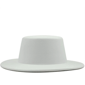 Detailed texture of a premium white flat-top wool felt boater hat for men and women