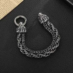 Close-up of vintage wolf head double-layer stainless steel chain bracelet for men
