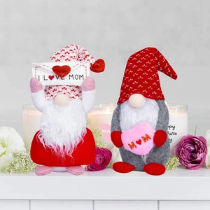 Detail view of two Mother's Day gnomes with I Love Mom envelope and heart designs
