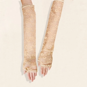 Detail of elegant beige lace arm sleeves featuring floral patterns and scalloped edges