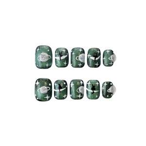 Handmade starry cat eye press-on nails set with deep green planet and cat moon designs