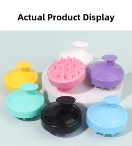 Detail showing silicone scalp massager brushes in seven vibrant colors on a white pedestal